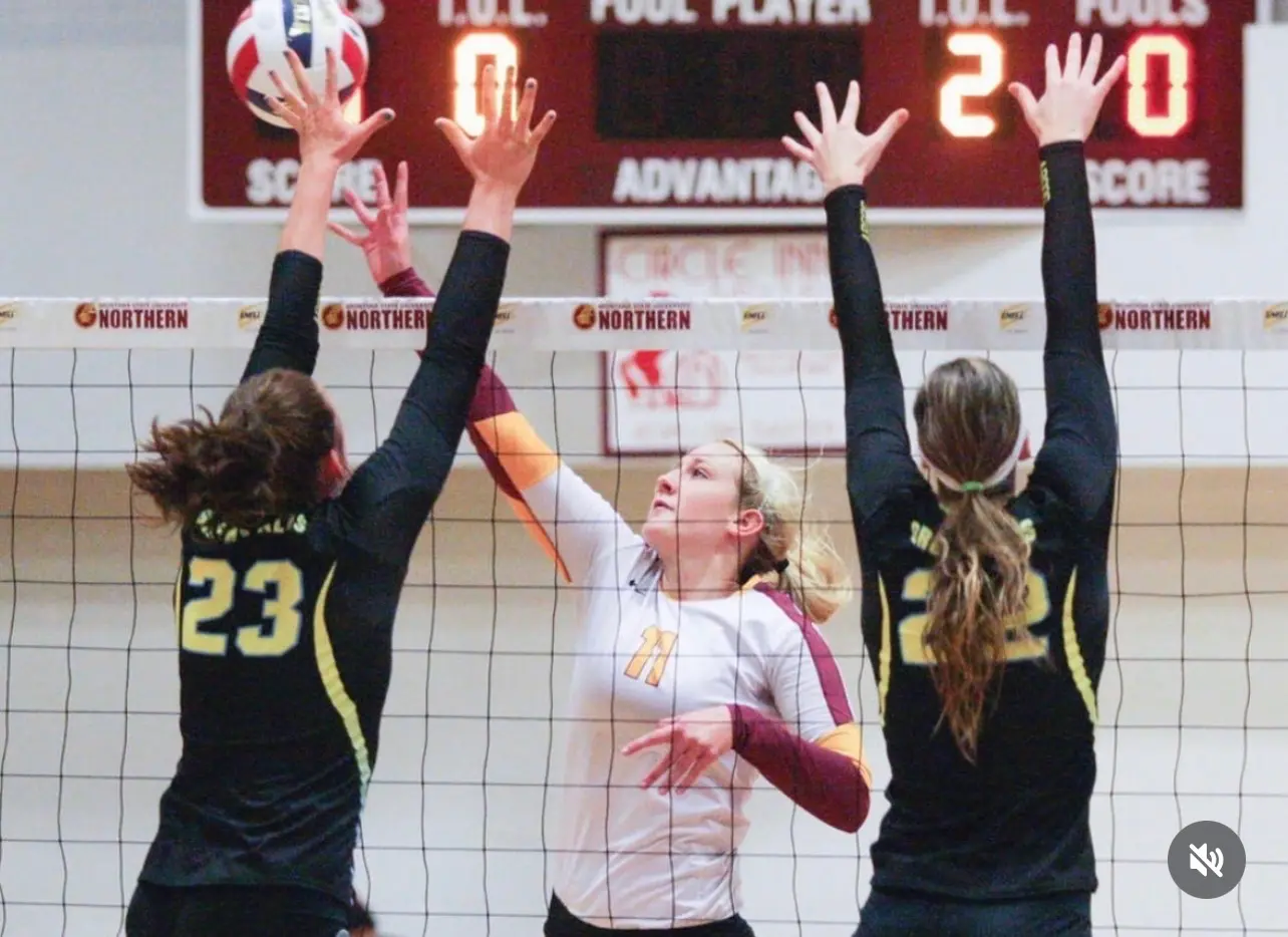 Jessica Finai mid-block at the net