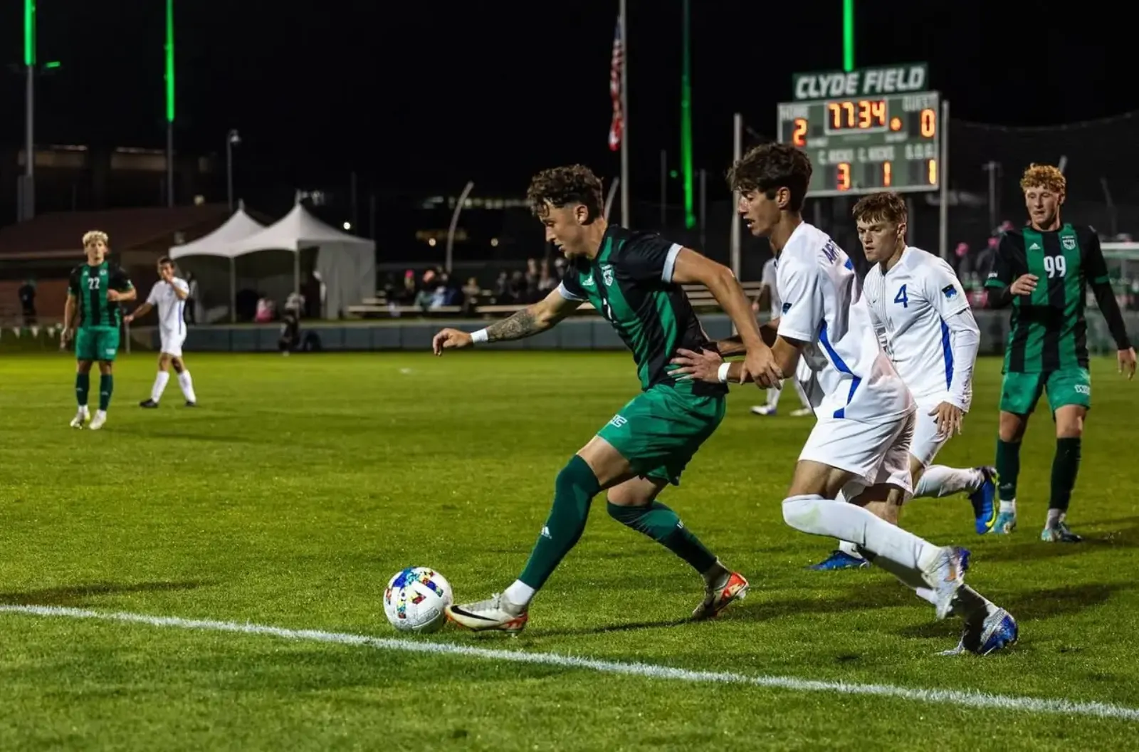 Nik Kizerian playing college soccer