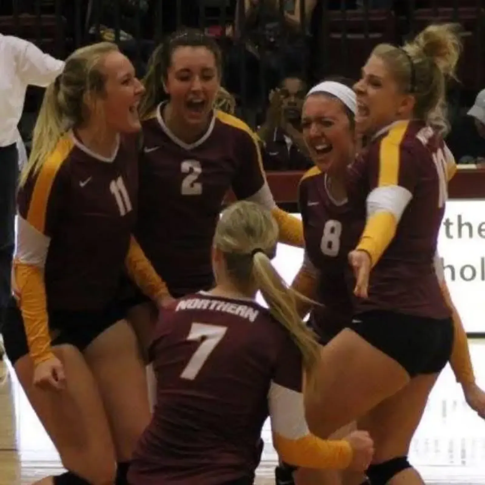 Jessica Finai celebrating with college teammates